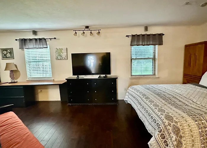 Tx Speedway Studio: Desk + Cowboy Dipping Pool By Vacation Your Way Fort Worth